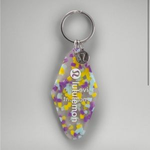 Hotel keychain in yellow,purple, and blue